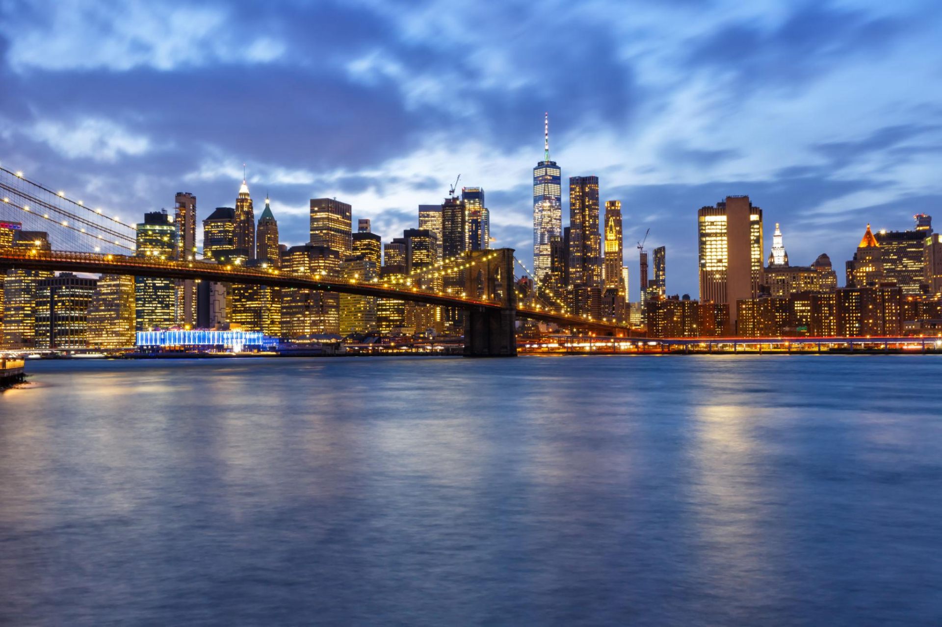 Manhattan skyline at twilight with the Brooklyn Bridge, New York City